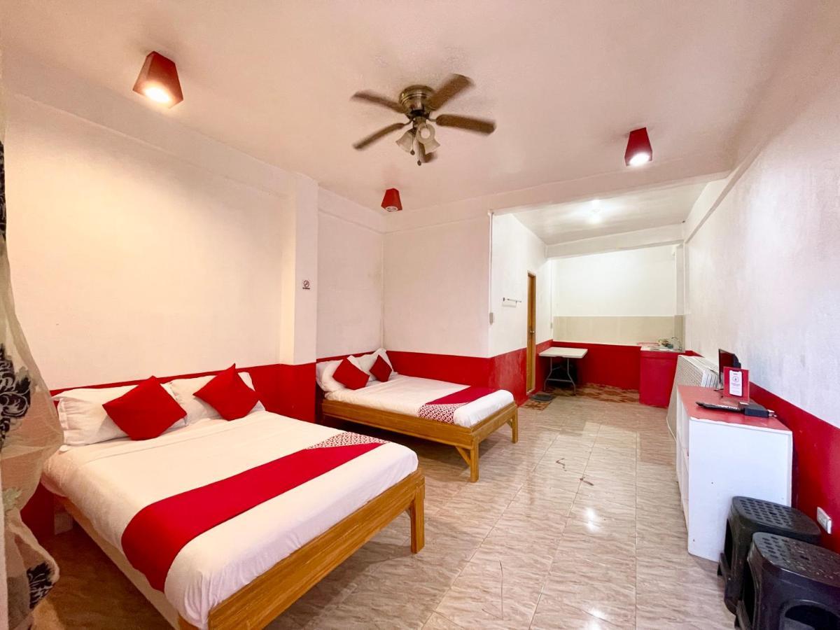 Oyo 899 Merie Diz Sunrise Beach Resort Oslob Buitenkant foto