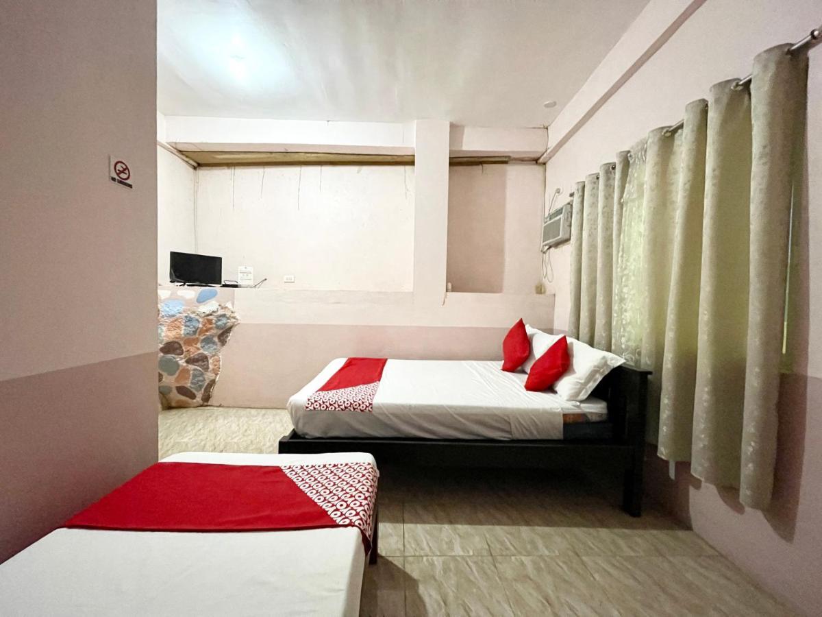 Oyo 899 Merie Diz Sunrise Beach Resort Oslob Buitenkant foto